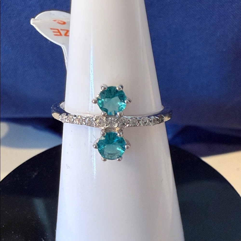 Dazzling Silver Ring with Blue Accents
